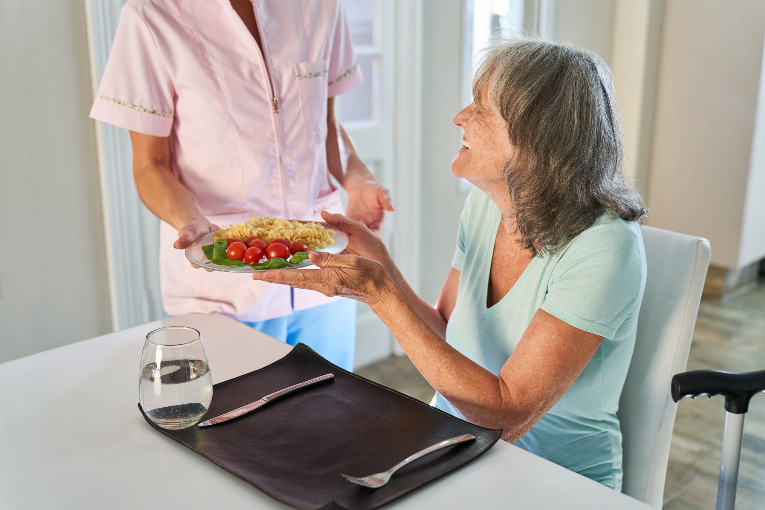 Grateful,Elderly,Woman,Is,Enjoying,Lunch,From,The,Delivery,Service