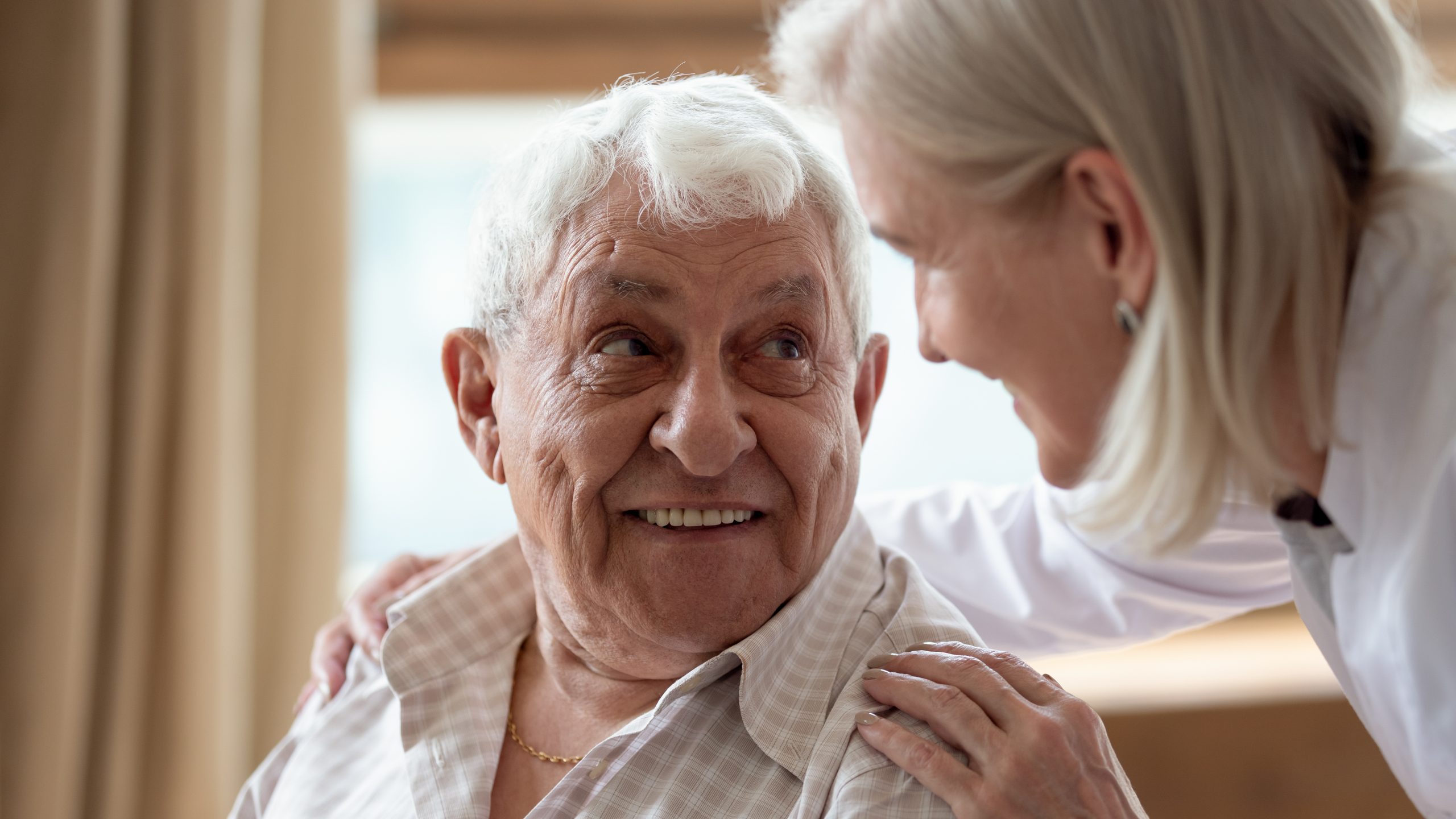 Head,Shot,Close,Up,Cheerful,Elderly,Man,Looking,At,Pleasant
